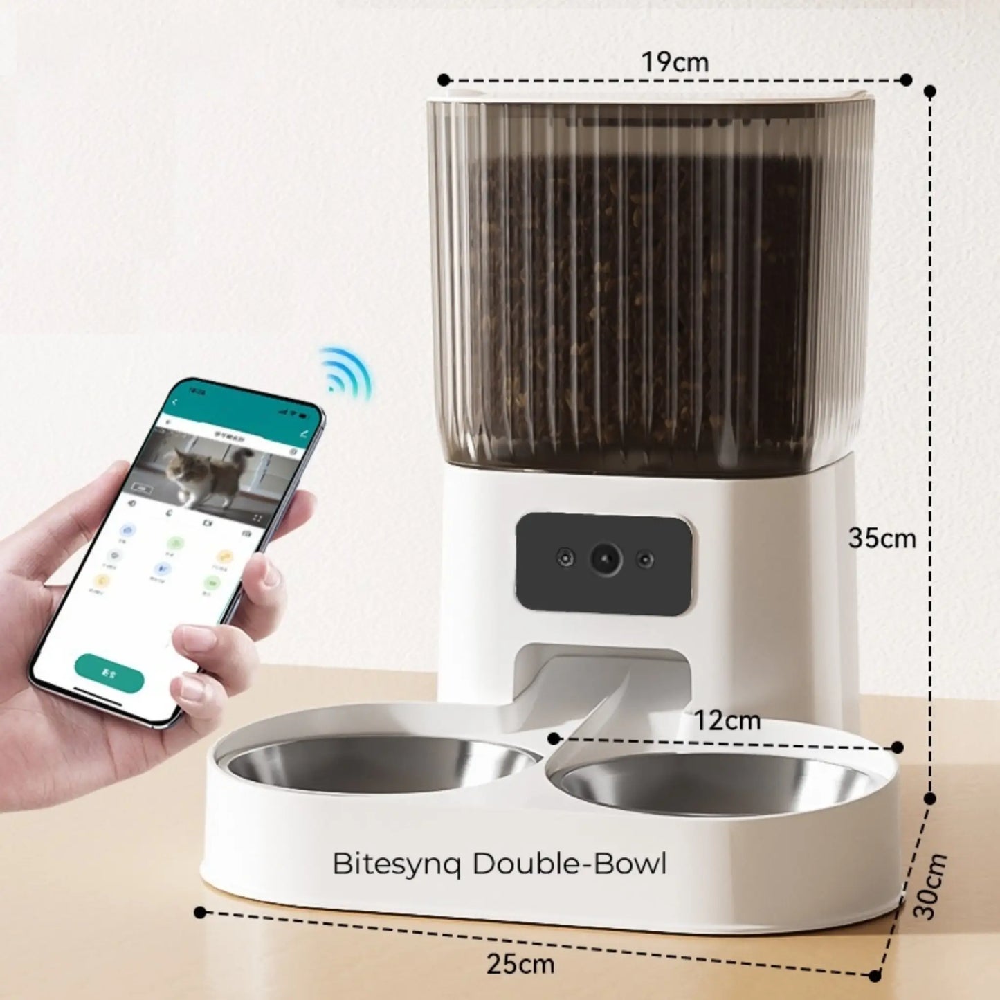 Bitesynq double-bowl pet feeder with smartphone app control and measurements on a light background