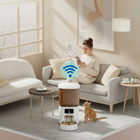 BiteSynq™ Smart Automatic Cat Feeder with Wi-Fi app control, shown in modern living room with cat.